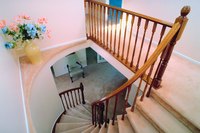 Cap-and-band installation is suited to fitting carpet to winding stairs.