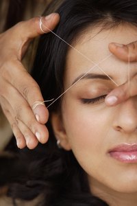 Threading is effective at removing facial hair.