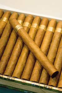 Cigar smokers appreciate the quality and clean burning flame of the Dunhill Rollagas lighter.