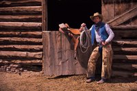A string bow tie makes an ideal accent for a cowboy outfit.