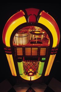 Cardboard can be painted to resemble the wood, metal and light-up features of a jukebox.
