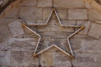 Decorative stars have an antique finish that makes them look old.