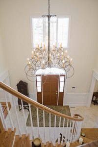 Chandelier placement is always important, especially on sloped ceilings.
