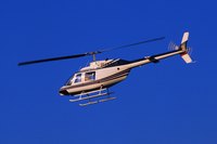 It's risky for helicopters to fly near power lines, but for some it's part of the job.