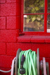 It takes a powerful drill to install window blinds in a cinder block home.
