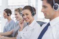 Woman smiling at call outsource center
