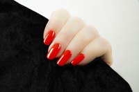 Complete your costume with a Morticia-style manicure.