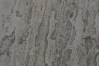 Tiny erosions in sandstone bring out unique patterns and colors.