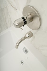 Thermostatic shower valves use a diverter that is separate from the valve itself.
