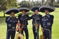 Mariachis carry on the charro tradition by wearing their uniforms.