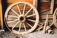 Create an exact miniature replica of this wagon wheel.