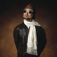 A vintage fighter pilot hat completes your military costume.