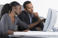 Partners working on a computer together