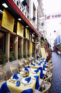 Outdoor dining, as at this restaurant in Brussels, is common throughout Belgium, so pack a jacket when you head out for lunch or dinner.