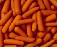 Prepare fresh carrots for freezing by blanching them in a microwave.