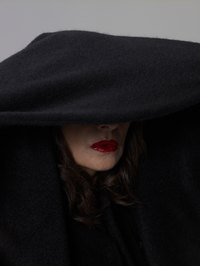 Making a hooded cape out of a bed sheet is a simple project.