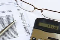 A bank statement and a calculator.