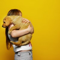Kids can accidentally hurt puppies when holding them.