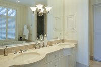Installing a new light fixture can increase the amount of light in your bathroom.
