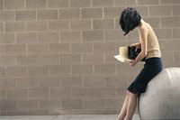 A thin cement layer may add decorative appeal to cinder block walls.