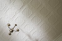 Install textured ceiling panels to hide flaws.