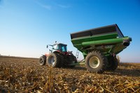 Tractors help people move items and plow through the earth.