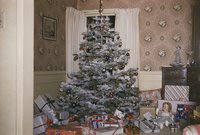 Artificial trees sometimes come with white accents as if covered with snow.