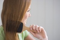 Woman brushing her hair