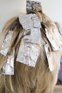 Have a friend help you apply color to the back of your head.