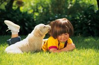 Your puppy continues to bond with his family during his third month.