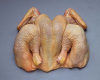 Cut whole chicken into pieces to use in a small toaster oven.