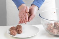 Cook and drain the meatballs to prevent the sweet and sour sauce from becoming greasy.