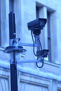 Photocells on security lights turn the lights on automatically at dusk.
