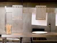 Heat lamps above food in restaurant