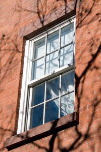 Many aluminum windows have plastic glazing beads.