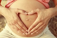 Remember your pregnant belly by making a cast of it.