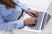 Woman giving online training course on her laptop