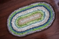 Crocheted rag rugs lend a homey -- and more important, warm for your feet -- touch to home decor.