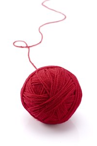 Cotton yarn will burn cleaner than a polyester, emitting less fumes.