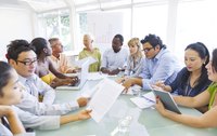 Large roundtable meeting with employees