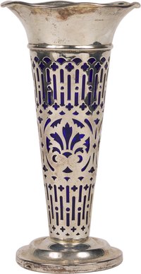 Some antique vases mix materials such as metal and glass.
