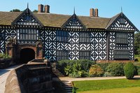 A Tudor style home has a unique timbered look.