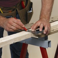 Using 2x4 inch boards will allow you to frame your basement poles.