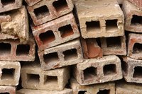 Cinder blocks have hollow cells and solid webbing.