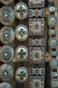 Concho belts often have turquoise and coral colors.