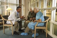 Doctor talking with senior couple