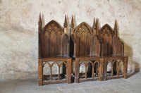 Gothic Revival chairs with church architecture.