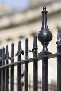 Wrought iron is more common in gates than in doors.