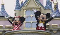 Mickey and Minnie Mouse mascots at Disneyland.