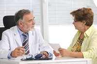 Doctor speaking with patient